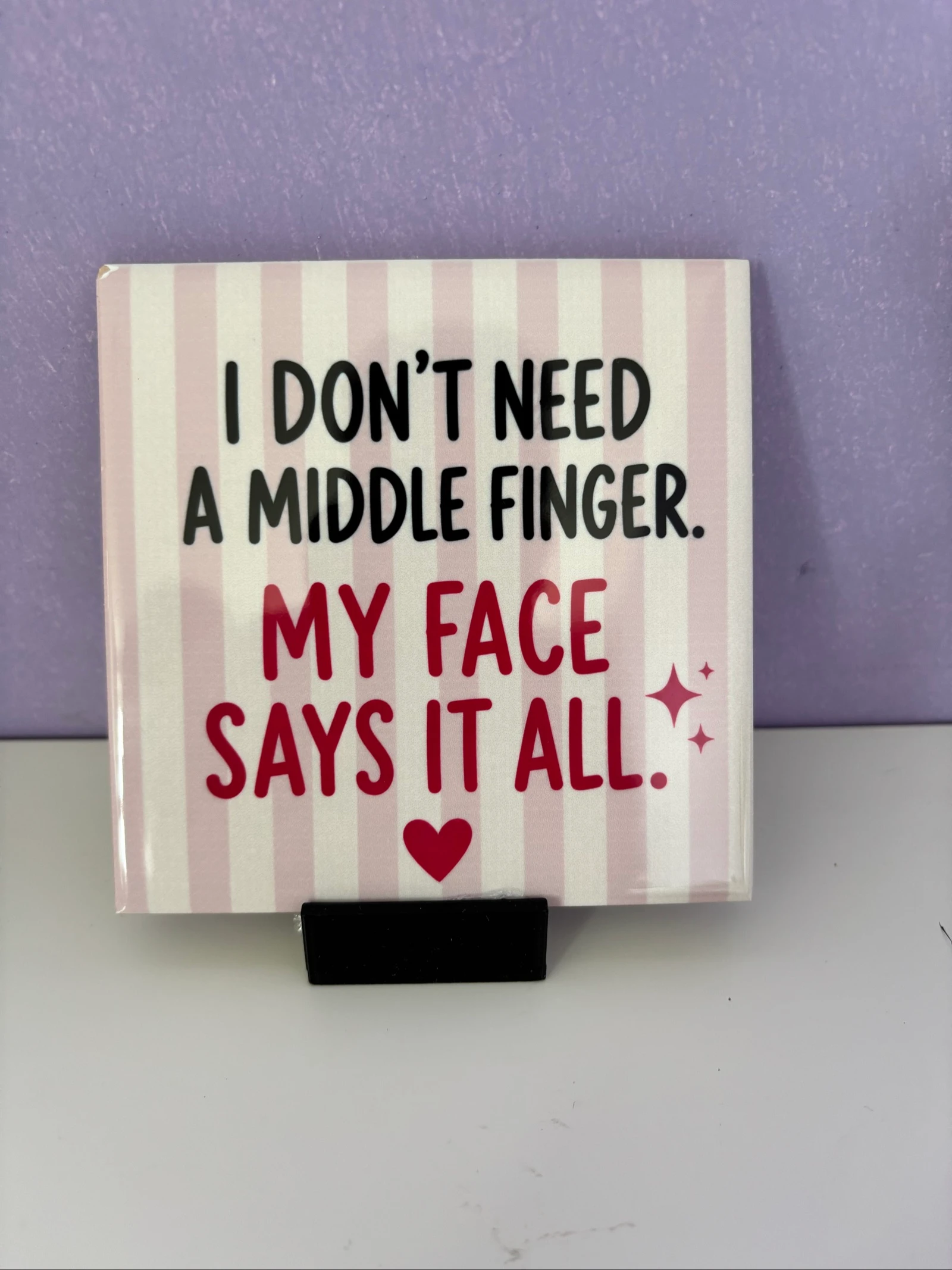 I don’t need a middle finger. My face says it all. 😏